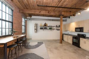 a kitchen and dining area in a loft